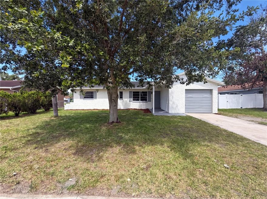 One or more photo(s) has been virtually staged. Check out 1114 N Forrest Ave, where recent property enhancements include a new roof, fresh interior paint, and fresh exterior paint, alongside a partial flooring replacement. The kitchen is equipped with all stainless steel appliances, complementing the refreshed interior. Outside, a fully fenced in backyard provides a defined outdoor space. This updated residence provides modern living, ready for you to enjoy.. Included 100-Day Home Warranty with buyer activation