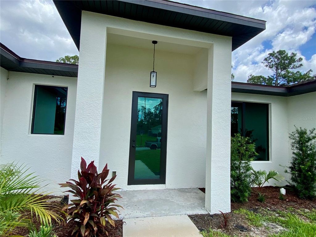 Photo of 3616 Bellefonte Avenue, North Port, FL 34286 (MLS # A4678369)