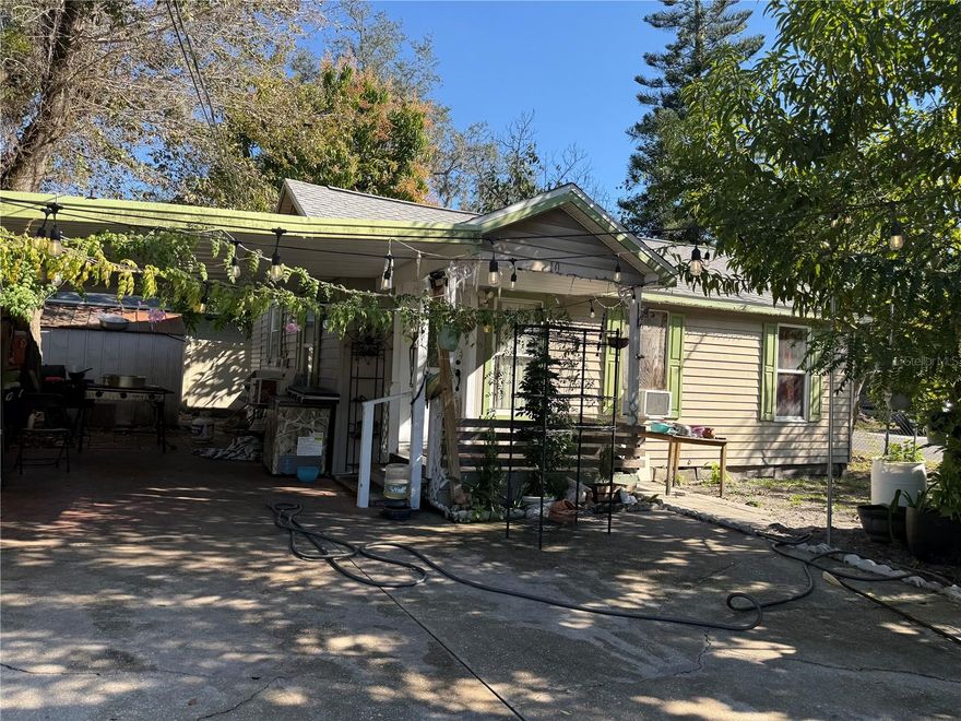 A Smart Buy with Endless Potential in Central Plant City. This home is walking distance from the iconic Strawberry Festival, local shops, dining, and everyday conveniences. Situated on a corner lot, this property offers added privacy by enhanced beautiful mature fruit trees that provide shade and character. The home features a covered carport, a fully fenced yard, and an outdoor metal shed for extra storage. A newer roof (2023) adds peace of mind, making this property an excellent opportunity for a primary residence or an investment rental. 
Don’t miss your chance to own a well-located property with strong potential in one of Plant City’s most desirable areas!