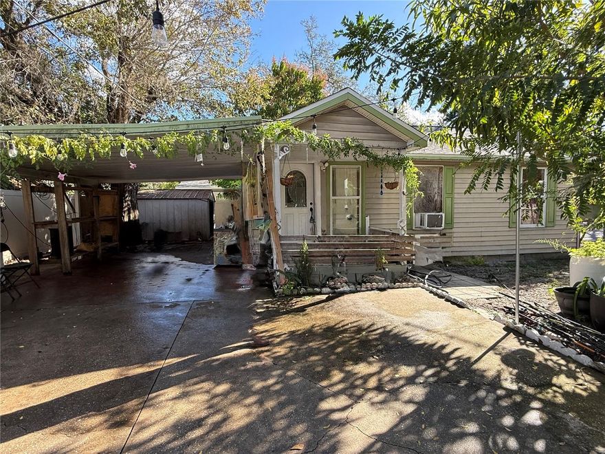 Price Improved! This is a Smart Buy with Endless Potential in Central Plant City. This home is walking distance from the iconic Strawberry Festival, local shops, dining, and everyday conveniences. Situated on a corner lot, this property offers added privacy by enhanced beautiful mature fruit trees that provide shade and character. The home features a covered carport, a fully fenced yard, and an outdoor metal shed for extra storage. A newer roof (2023) adds peace of mind, making this property an excellent opportunity for a primary residence or an investment rental. Don’t miss your chance to own a well-located property with strong potential!