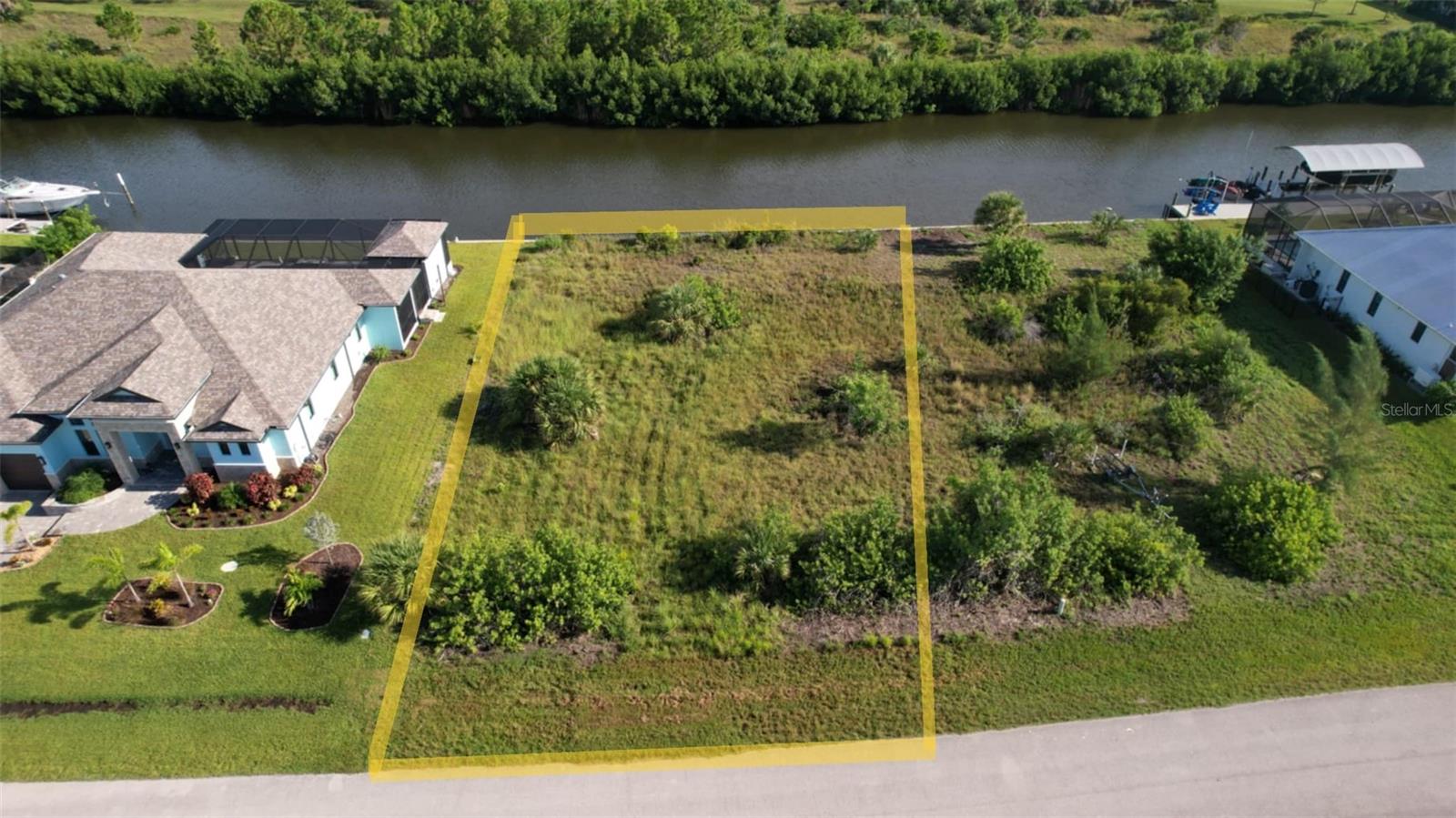 Unlock the ultimate Florida lifestyle with this prime 0.26-acre waterfront lot in the coveted South Gulf Cove community. Boasting 87.5 feet of concrete seawall along the sailboat-friendly Tate Waterway, this mostly cleared parcel offers direct, bridge-free access to the Myakka River, Charlotte Harbor, and the Gulf of Mexico—perfect for boating and fishing enthusiasts. As one of the closest canals to South Gulf Cove’s lock system, this oversized lot provides ample space for a custom home, pool, and private dock, ideal for embracing coastal living. Located in Section 93 with an optional low-fee HOA, this property is just minutes from Boca Grande, Englewood Beach, golf courses, shopping, and dining. Whether you’re a boater, investor, or dreaming of retirement in paradise, this lot is a rare opportunity to build now or invest for the future. Don’t miss out—tour this property today!