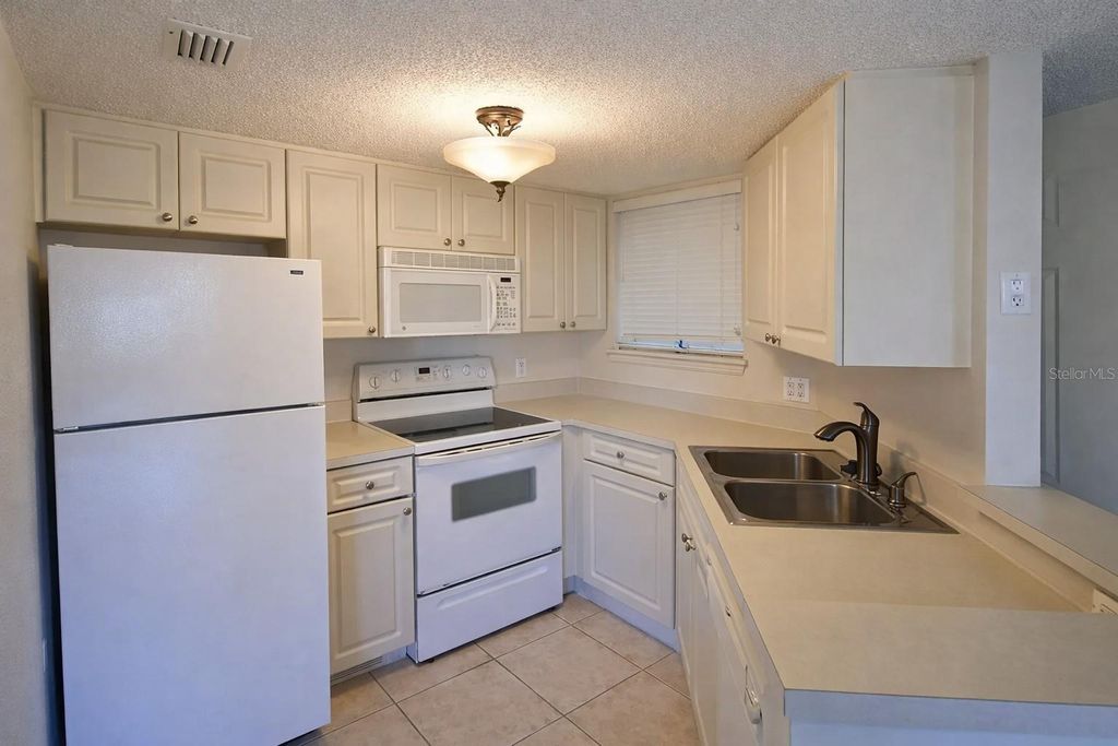 Photo of 1908 Lake Atriums Circle #15, Orlando, FL 32839 (MLS # O6381262)