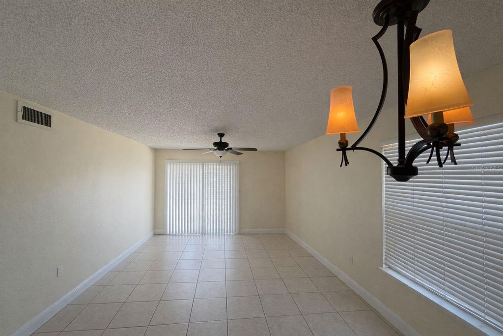 Photo of 1908 Lake Atriums Circle #15, Orlando, FL 32839 (MLS # O6381262)