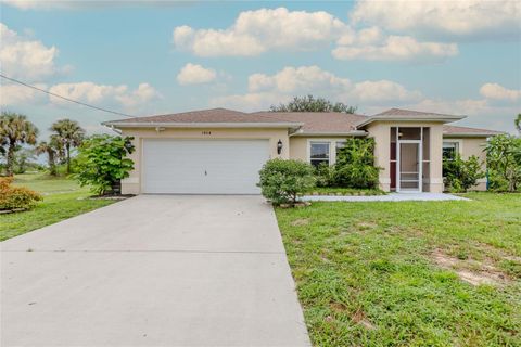Photo of 1404 Curtis Avenue S, Lehigh Acres, FL 33976 (MLS # C7513266)