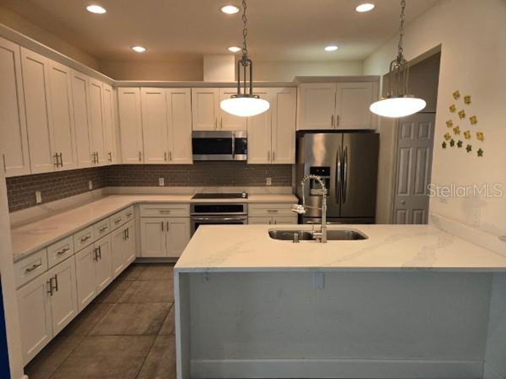 Photo of 922 Centaury Drive, Kissimmee, FL 34759 (MLS # O6410711)