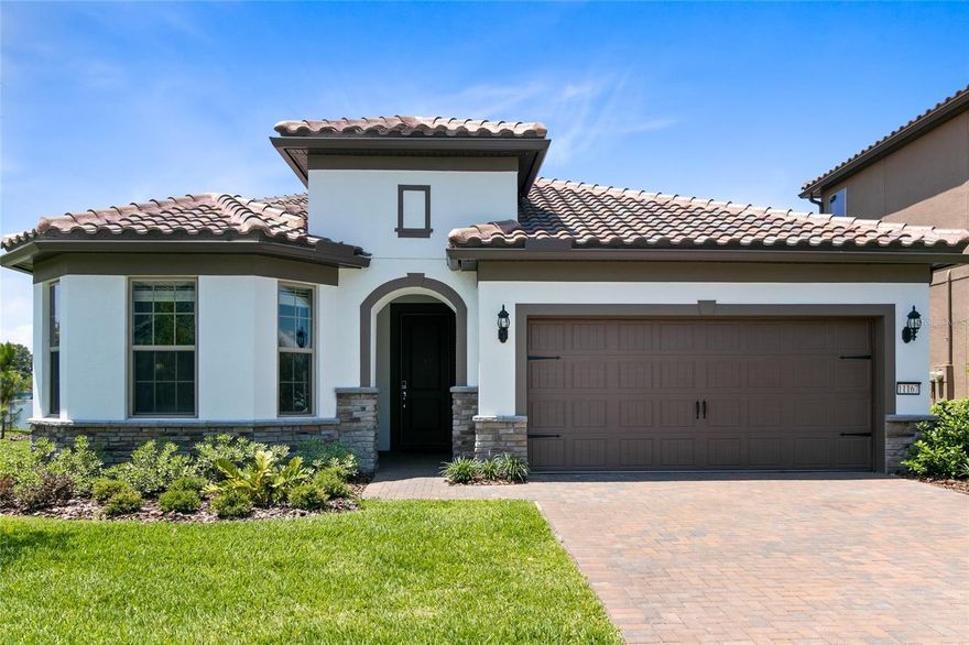 This beautiful 4 bedroom/3.5 bathroom home will not be available for long. Located in the Ruby Lake community in the Dr. Phillip’s area. The gourmet kitchen has all stainless steel appliances, built in gas cook top and a double oven/microwave combo. The kitchen looks over the Family room with sliding glass doors that leads to the covered lanai with built-in grill and mini-refrigerator, the perfect outdoor kitchen. There is a flex space off the kitchen that can be used for an office, play area or bedroom. Off the main living room is the first floor master suite, one of two master suites. The ensuite bathroom has separate vanities providing plenty of space, large walk-in closets, glass walk-in shower and soaker tub. The second master suite and ensuite has double bowl sink, shower and tub combo with a large walk-in closet. Spacious laundry room with washer/dryer hook-ups and stainless steel sink with granite counter tops. Upstairs is the an additional bedroom with a full bath. The loft area would be great for a second living room or media room. The community amenities feature a beautiful community pool, tennis court and pier with firework viewing on the Lake Ruby. As part of Keller Williams' dedication to resident satisfaction, you'll have access to our exclusive Resident Benefits Package (RBP). This includes perks such as HVAC air filter delivery, renters insurance, credit-building opportunities, $1M Identity Protection, and utility concierge service, ensuring a stress-free move-in experience. Located near great restaurants and shopping. Short commute to I4.