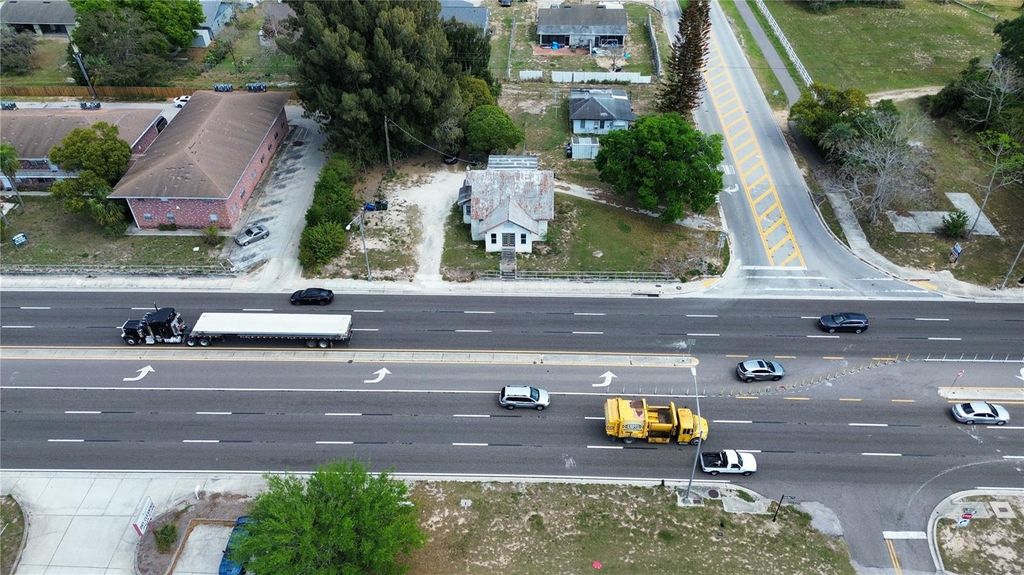 Photo of 980 S Lake Shore Way, Lake Alfred, FL 33850 (MLS # S5145068)