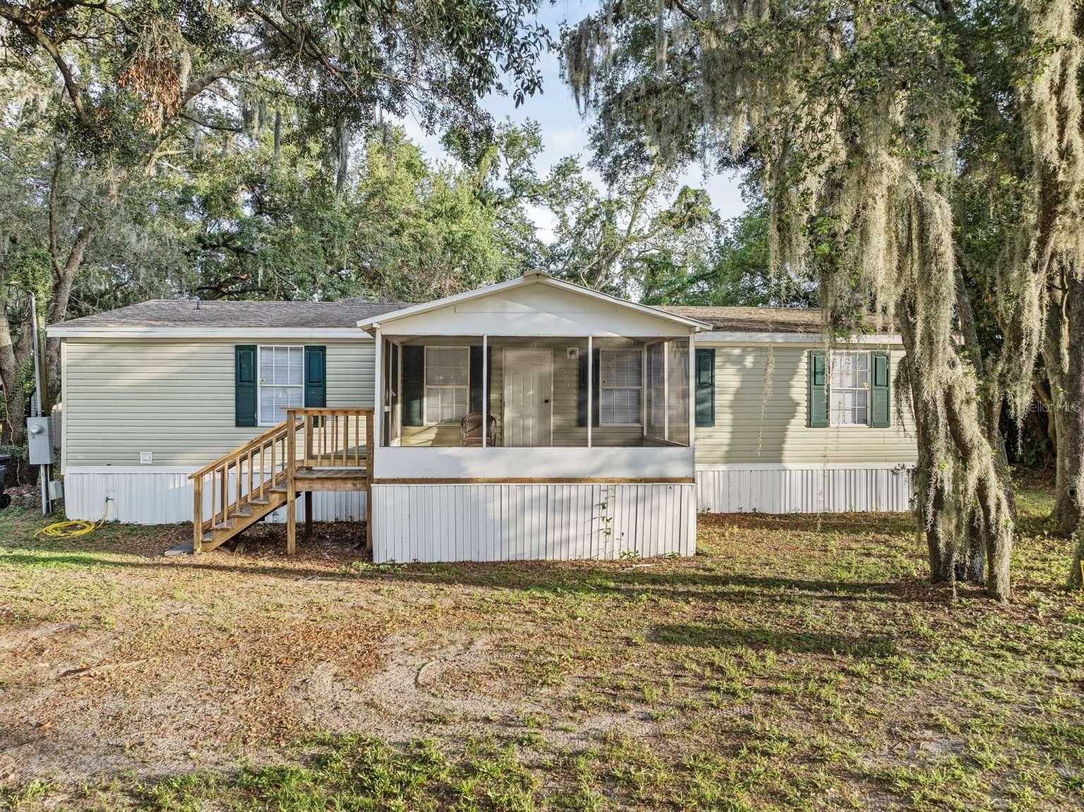 Welcome to this beautifully updated manufactured home nestled on just over 0.3 acres of fully fenced property—perfect for privacy, pets, and outdoor enjoyment. Step onto the inviting screened front porch, ideal for relaxing mornings or shaded evenings.
Inside, you'll love the fresh, modern touches throughout. The home features new luxury vinyl plank (LVP) flooring for durability and style, along with stainless steel appliances that elevate the updated kitchen. Enjoy peace of mind with a newer AC unit and roof, ensuring comfort and efficiency for years to come.
This property combines value, convenience, and comfort—ready for its next owner to move right in. Don’t miss this great opportunity to own a home with space to stretch out both inside and out!