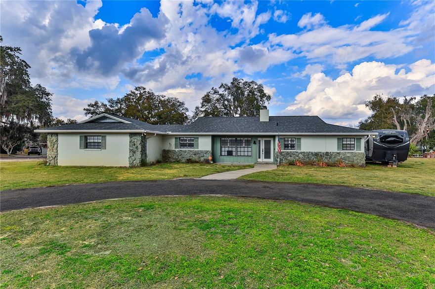 Welcome to this charming home in the Inverness Golf and Country Club, featuring a new roof installed in 2025. Step inside to discover an expansive living area and a well-appointed kitchen with ample cabinet space, stunning quartz countertops, and a new stainless steel refrigerator. Adjacent to the kitchen is an indoor laundry room that leads to the garage, which includes a separate door for your golf cart, built-ins for storage bins, and a newer water softener. The home offers two generously sized bedrooms, with the primary suite boasting a walk-in shower and the spare bathroom featuring a convenient shower-tub combo. Relax or entertain in the inviting Florida room. Situated on a nearly half-acre lot, the property includes a new shed with power, a new 6-foot metal privacy fence, a large chicken coop, a 30-amp RV hookup on the side of the house, and ample space to add a pool. Golf and social memberships are available at the Inverness Golf & Country Club. Call today to make it yours!