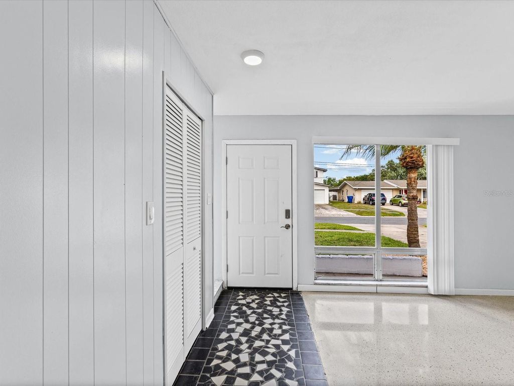 Photo of 865 Imperial Drive, Largo, FL 33771 (MLS # TB8498052)