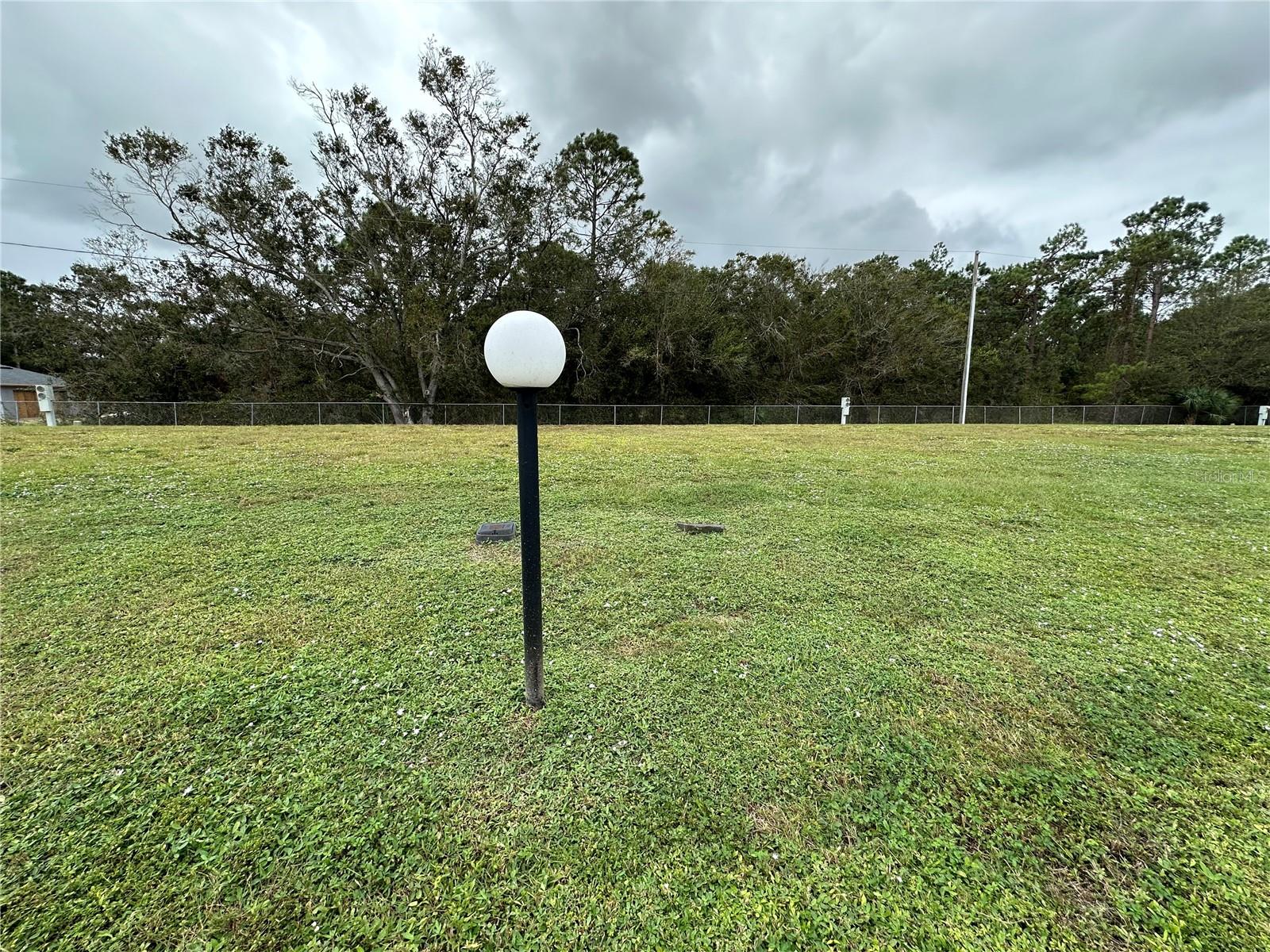 LILY LAKE GOLF & RV RESORT WHERE YOU "OWN" YOUR LOT! TWO LOTS AWAIT YOUR NEW MANUFACTURED HOME! UTILITIES ARE LOCATED ON EACH LOT & INCLUDE underground ELECTRIC, WATER, SEWER (yours to hook up). LILY LAKE GOLF & RV RESORT is a 55+ Golf Cart friendly Community with a 9 Hole Golf Course, gated with 3 gate locations, several Dog Parks, Clubhouse, Pool, Pickle Ball Courts, Planned Activities & MUCH MORE! The main gate sits back off Hwy 27 for easy access North to shopping, Orlando attractions & International Airport, Legoland, Bok Tower & More, AND South to Highlands County & Shopping, Restaurants, & More. Drive 10 Minutes to Hwy 60 that runs East/West through Central Florida giving you access to the East to Tampa International Airport, Salvi Dali Museum, many different international food stores/restaurants, Gulf of Mexico & Much More, AND West to the Atlantic Ocean and Much More! COME CHECK US OUT!