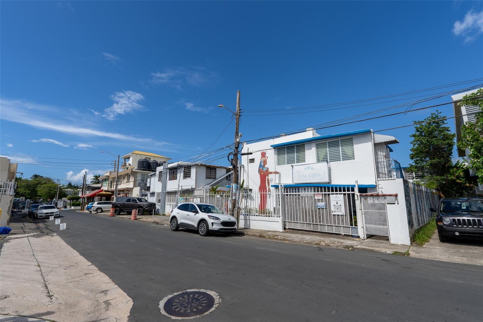 Hostel for sale in Ocean Park. This lucrative business, with hotel permits, houses 30 people. In addition, it offers all alcohol sales permits to operate a bar and canteen.
This commercial property is situated in a prime location, cross streets between Loiza and Mcleary and conveniently located in proximity of the pharmacy, steps from Kasalta and Pirilo pizzeria.
The property consists of two, two-level concrete structures, measuring 3,670sqf, on a 461m2 lot. It has 10 bedrooms and 9 bathrooms, private and shared kitchens and dining rooms, bar, reception area and laundry area. It also has its terraces and common areas that are cozy and spacious. Take advantage of this great investment opportunity with tremendous potential to grow and expand.