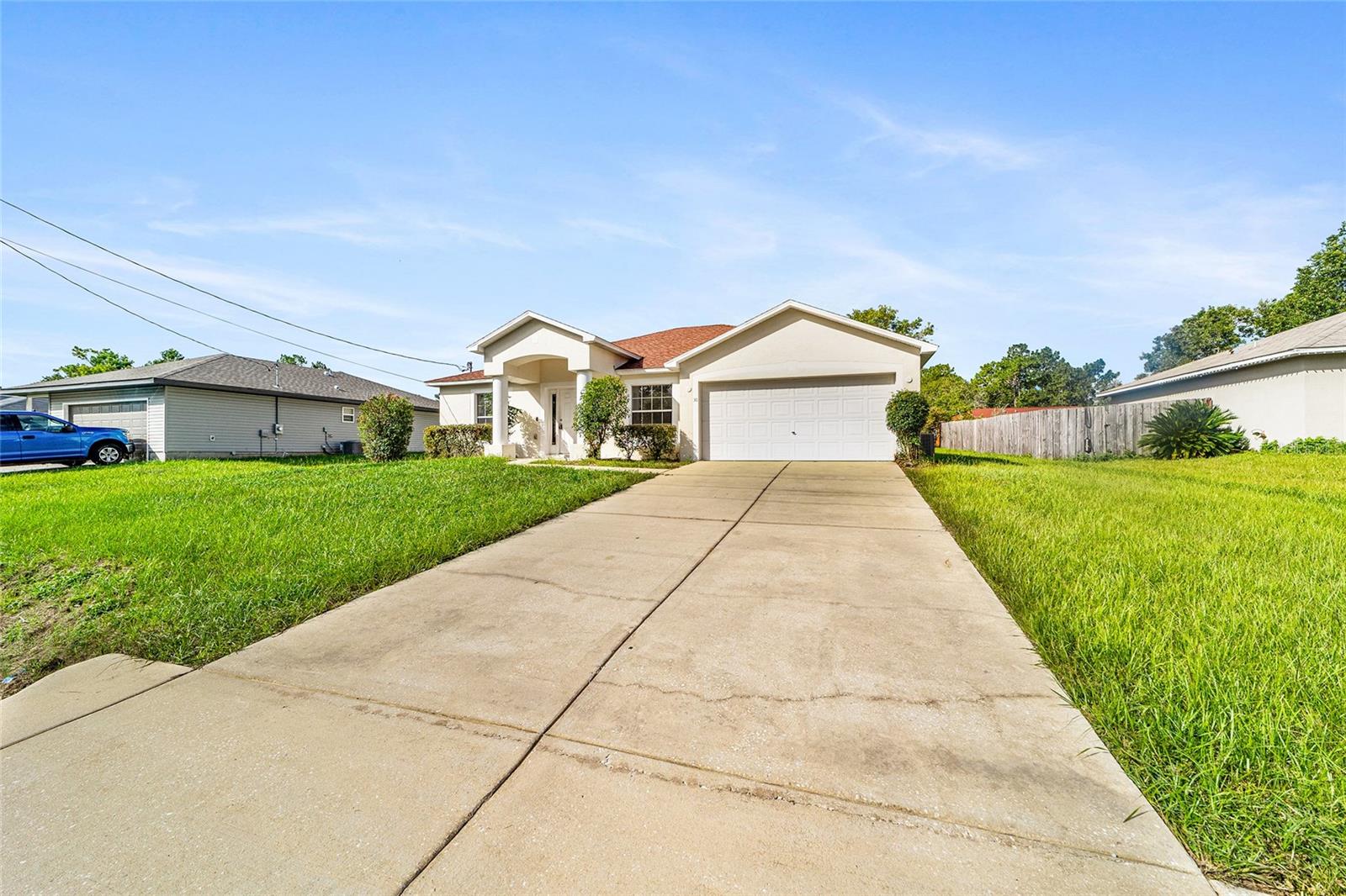 Welcome home to this beautifully maintained 3-bedroom, 2-bathroom residence located in the heart of Southeast Ocala featuring new LVP flooring and freshly painted. ROOF 2022, AC 2024. Nestled in a quiet, established neighborhood, this home offers both comfort and convenience with a spacious split-bedroom floor plan designed for modern living. The open-concept living and dining area features vaulted ceilings and plenty of natural light, creating a warm and inviting atmosphere. The kitchen includes ample cabinet space, and a breakfast bar. The primary suite offers a peaceful retreat with a walk-in closet and private bathroom featuring a walk-in shower. Two additional bedrooms are ideal for family, guests, or a home office, and the second full bathroom is conveniently located. Outside, enjoy a covered patio, perfect for relaxing or entertaining. The property also includes an attached two-car garage and an indoor laundry room. Located just minutes from shopping, dining, schools, and medical facilities, with easy access to downtown Ocala and major highways, this move-in ready home combines functionality with location and value. Don’t miss your chance to own this Southeast Ocala gem! *Realtors please read the Realtor Remarks*
