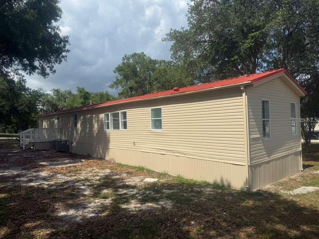 Photo of 1650 Belmont Avenue #29, Mulberry, FL 33860 (MLS # O6409918)
