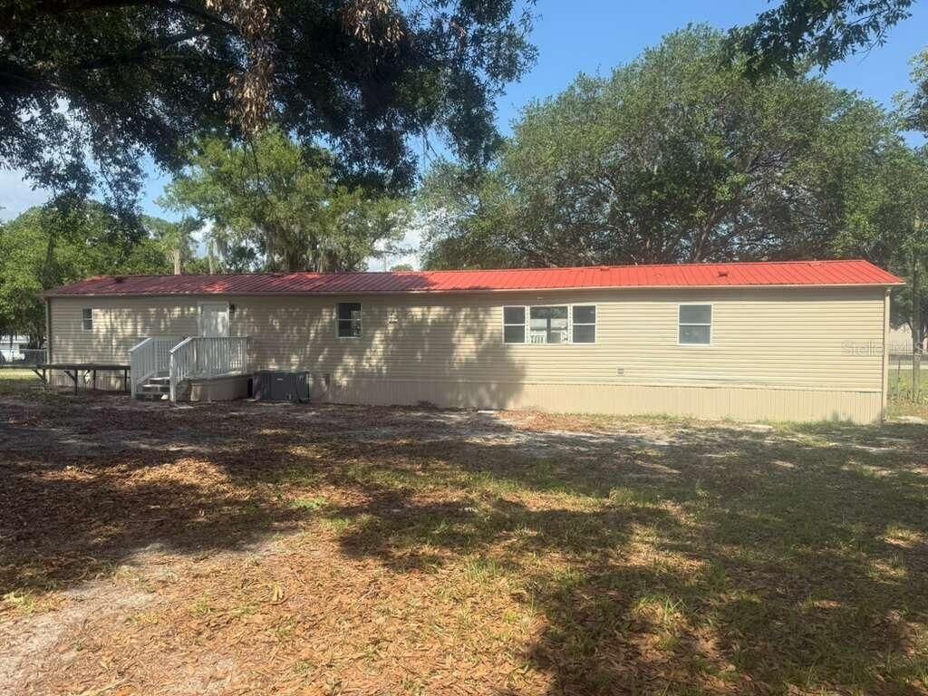 Photo of 1650 Belmont Avenue #29, Mulberry, FL 33860 (MLS # O6409918)