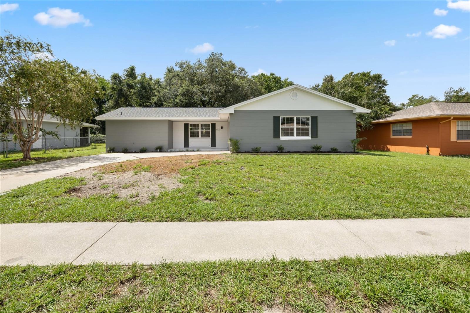 Immaculate 2BR/2BA home in desirable Marion Oaks, completely renovated in 2025! Brand new roof, 220-amp electric panel, HVAC, , water heater, appliances, and stunning interior finishes. Kitchen and baths fully updated with quartz counters, new vanities, shower pan, toilets, and modern fixtures. Luxury vinyl plank flooring throughout main living areas, plush carpet in bedrooms. Light-filled, open layout with fresh, neutral colors. Rear yard offers space for pets or gardening. Move-in ready, perfect for traditional loan buyers or cash! A must-see that won't last!