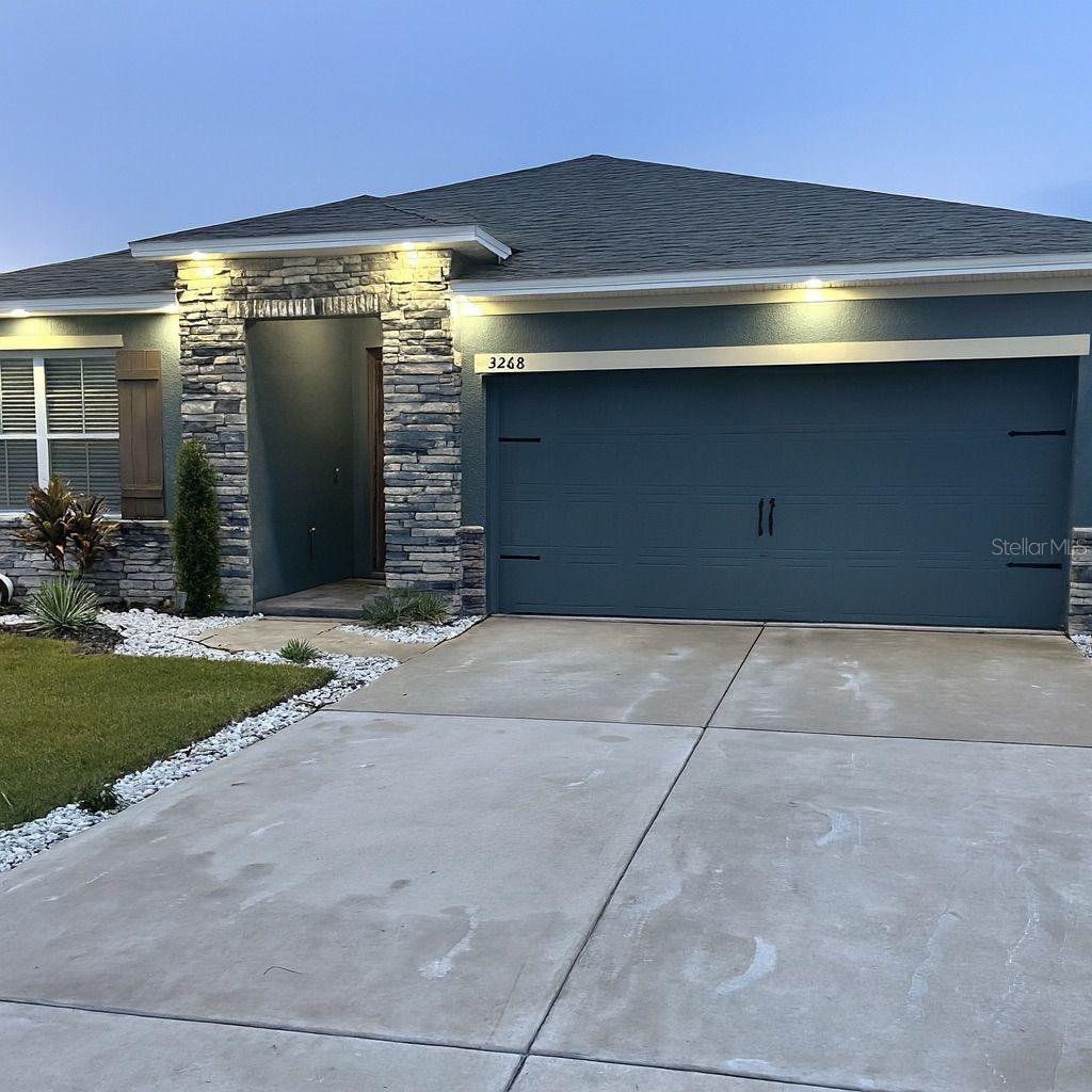 Discover this charming 3-bedroom, 2-bath single-family home located in the desirable Country Walk community of Winter Haven. This property offers comfort, style, and a prime location. Its open-concept design features ceramic tile and carpet flooring, solid surface countertops, energy-efficient windows, and an inside laundry room. The primary suite includes a spacious walk-in closet and a private bath for your comfort. You’ll also enjoy a family room transformed into a spectacular home theater, the perfect space to watch your favorite movies or create unforgettable moments with family and friends. Exterior highlights include a covered lanai for outdoor relaxation, an attached garage with direct access to the home, and an irrigation system that adds convenience to this property. The community offers a playground for the little ones to enjoy. Its location is unbeatable—close to shopping, dining, schools, area attractions, and only 10 minutes from Legoland. More Photos Coming Soon!!!