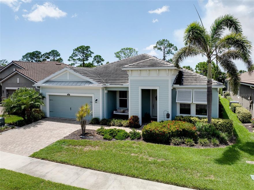 This Hampton model in the Renaissance community of Wellen Park is immaculate and full of upgrades. Why wait to build and pay for
enhancements already in place here. Spacious and modern, from the moment you step inside, you are immediately impressed by the space,
which is highlighted by stylish lighting, designer finishes, and tons of sunlight flowing in from the large windows. You’ll adore the stunning views
and well-manicured curb appeal that blend in with the mature trees and lush greenery. A bright and open living area seamlessly connects to the
kitchen and dining area with hard wood flooring, meaning whether you’re watching your favorite program or hosting a meal, you’ll never be
bored. The kitchen pops out with a soft white tile backsplash and boasts quarts countertops, high-quality stainless-steel appliances, plenty of
cabinet space, and a good-sized island. Don't miss the high ceilings with tongue and groove tray ceilings. The entertainment space continues
outside through full wall sliding glass doors to the large covered patio, where you can soak in the serene environment in your hot tub. Primary
suite offers large walk in closet with direct access to laundry room, dual sinks and a generous sized walk in shower. Split floor plan featuring
ensuite bathroom for one guest bedroom giving option of double primaries. The bedrooms are well-appointed and spacious, featuring BRAND
NEW carpeted floors, ceiling fans, and ample closet space. Additional features of this remarkable home include office/den/flex room, 8 foot
doors, smart thermostat and light fixtures, a laundry room, large pantry, and a built-in drop station off the spacious garage. Renaissance
offers a resort lifestyle with full gym, expansive community pool, playground, pickle-ball, bocce ball, tennis courts, private entrance to 33 acre
park, and a full time activities director. Close to everything you want and need! Braves Spring Training, Shopping, Beaches, Downtown Wellen
Park, Golf and more just minutes away. SELLER  IS WILLING TO REPLACE FLOORING WITH REASONABLE OFFER BEFORE CLOSING WITH BUYERS CHOICE.