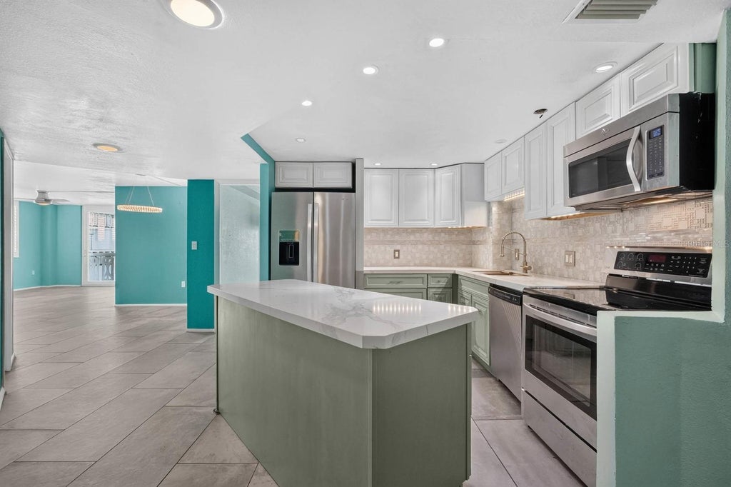 Photo of 935 N Halifax Avenue #406, Daytona Beach, FL 32118 (MLS # FC319671)