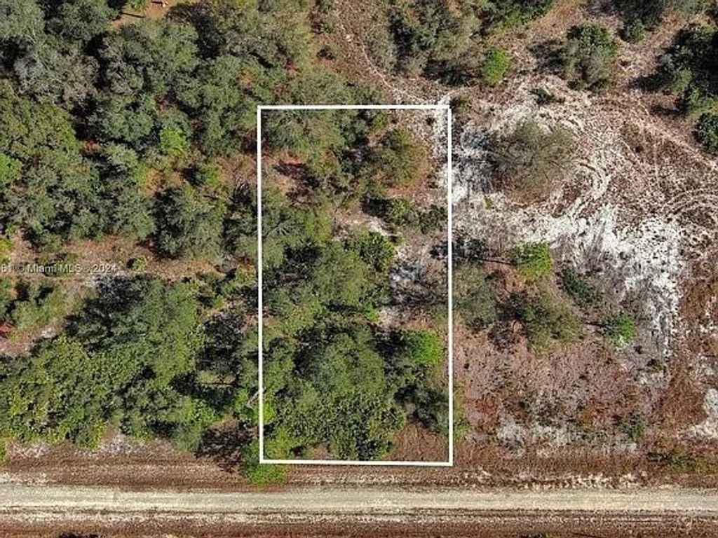 Photo of 4701 Karen Avenue S, Lehigh Acres, FL 33976 (MLS # O6344778)