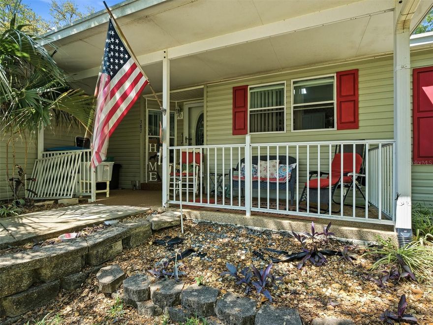 Welcome to Lighthouse Cove, a gated golf-cart friendly community nestled in the charming town of Oak Hill, Florida. This beautifully maintained 3- bedroom 2-bath home sits on a lush corner lot surrounded by mature trees and native greenery. The owners are including most of the furnishings such as bedroom suites, sofas, an electric reclining loveseat, tables, lamps and wall hangings. Dining table and 6 chairs makes it practically turn key. Relax and enjoy morning coffee or cool evenings on the furnished side porch with a spacious 14x8 storage room, an added bonus for your holiday decor, hobbies or beach toys. Inside, the open floor plan is filled with natural light from large windows and a skylight. The kitchen features newer luxury vinyl plank flooring, updated appliances, a stylish new faucet, and a central island offering extra counter space and storage, perfect for meal prep and entertaining. The cozy, inviting family room could make a perfect sports watching area, as well as listening for frogs singing after a rain, or owls hooting from the dedicated green space. The sunny living room with its vaulted ceilings and huge triple windows is your go-to space for relaxing with a good book and a refreshing drink. The primary suite easily accommodates a king sized bed and includes a spa-like bathroom with ocean decor, with garden tub, a walk-in shower and a double sink vanity. Guest bedrooms are located on the opposite side of the home for added privacy, and the third bedroom makes a great home office or flex space.  Lighthouse Cove is perfect for a winter retreat or a year round home with a community pool, pickleball and shuffleboard courts, and a newly renovated clubhouse where various committees meet and friendly groups play cards, bingo and shoot pool. You are just minutes from the natural beauty of Seminole Rest Park, and Canaveral National Seashore, the excitement of Kennedy Space Center and the world-class fishing/shrimping of Mosquito Lagoon. Don't miss this opportunity to live where nature meets comfort and convenience!