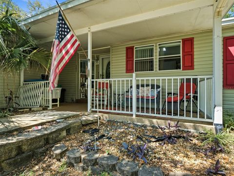 Photo of 387 Marsh Landing Loop, Oak Hill, FL 32759 (MLS # NS1087799)