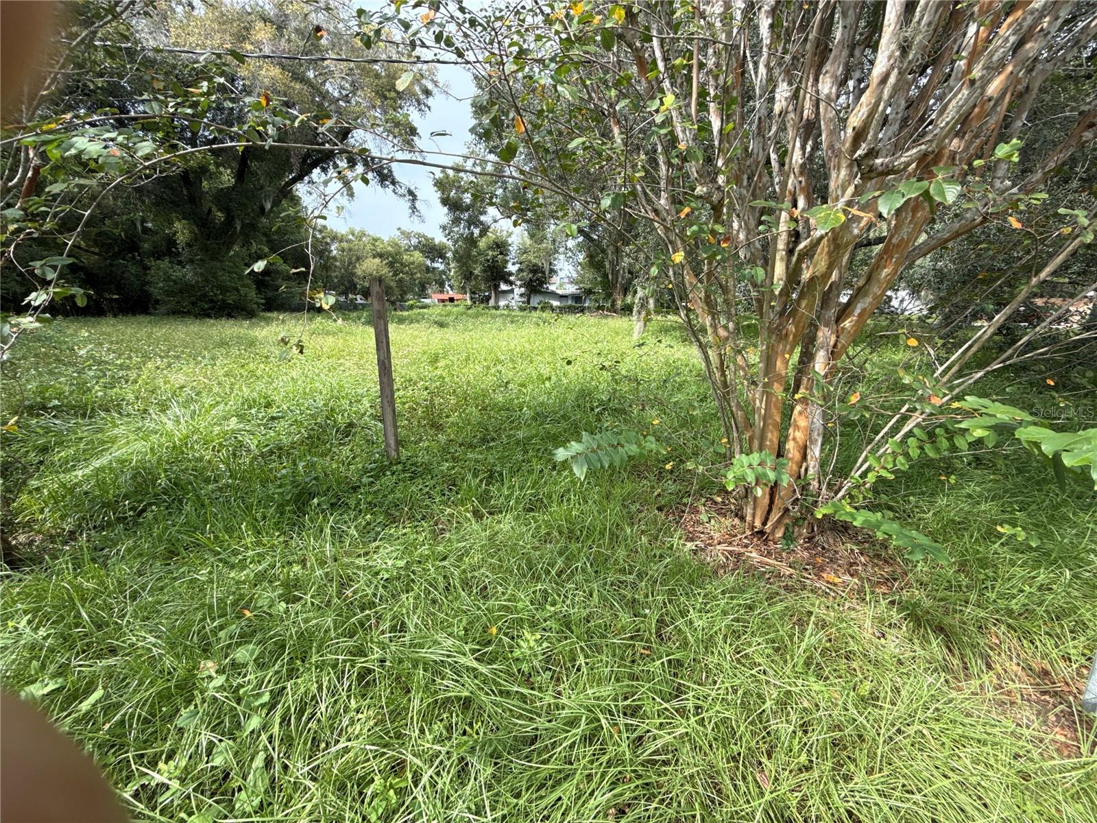 Short Sale. Short Sale. Subject to seller's lender(s) approval of contract, terms. Property sold as-is. Buyer responsible for due diligence, including verifying HOA, taxes, fees, and condition. subject to lender approval and may be adjusted. MORE PHOTOS COMING SOON! Situated just off Michigan Avenue near the tranquil waters of Lake Holden, this vacant lot offers a rare opportunity to build your dream home in a peaceful yet central Orlando location. Enjoy quiet lakefront living while being only minutes from downtown, SoDo, and the vibrant shopping, dining, and entertainment districts nearby. With quick access to major highways, theme parks, and cultural attractions, this property combines serene surroundings with unbeatable convenience.