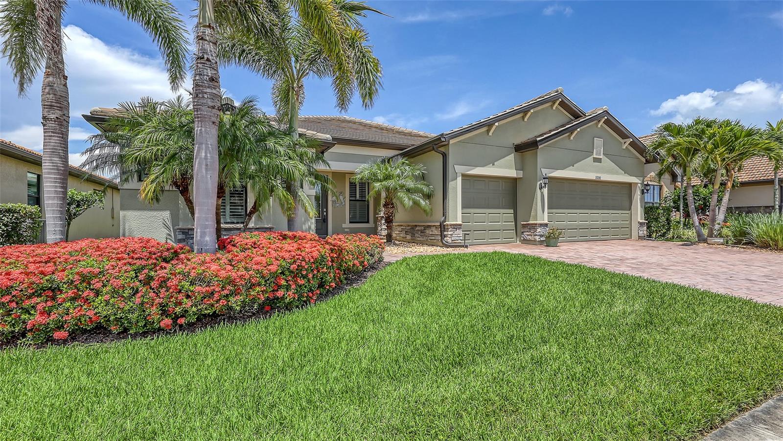 Immaculate & move in ready maintenance free pool home on private lake lot in Sandhill Preserve. This popular Pinnacle floor plan boasts over 2500 sq. ft. under air with 3 bedrooms, 3 baths, office & expanded 3 car garage.. Featuring one of the largest custom pools, 36 x 16, in this community. (you can even swim laps) The ultimate in hurricane protection featuring all impact windows & doors with a whole house generator. Very open & spacious great room floor plan with gourmet kitchen featuring large center island, white cabinets, granite counters & upgraded stainless appliances. Recently updated A/C and hot water heater. Pool is salt water with a heat pump pool heater. Upgraded tile on the diagonal throughout the living area. Upgraded landscape lighting. You will love the water views from your screened in pool & covered lanai. Maintenance fee includes all landscaping, irrigation maintenance as well as access to the resort style amenities. Sandhill Preserve is a maintenance free resort style community with a state of the art clubhouse, activity director, fitness, tennis, heated pool/spa pickle ball & more* This is a boutique community of just 303 homes located close to shopping, Legacy Trail & minutes to world famous Siesta Key Beaches*