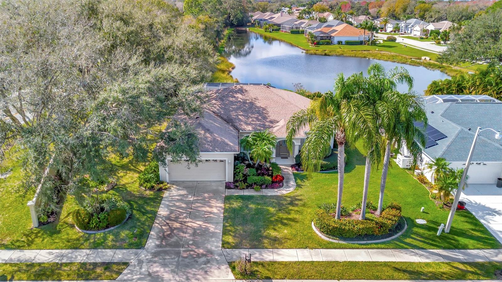 Rented Jan-March 20126. Waterfront Pool Home with Full “Class A” Golf Membership in Tara Golf & Country Club! Welcome to this beautifully maintained 2-bedroom + den, 2-bath, 2-car garage home offering breathtaking water views and stunning sunsets from your private pool area. Located in the highly sought-after Tara Golf & Country Club, this home includes a full “Class A” golf membership — a dream come true for any golf enthusiast! Inside, you'll find oak-look tile flooring throughout, combining elegance with easy maintenance. The open-concept kitchen features granite countertops, stainless steel appliances, wood cabinetry, and a pantry, perfect for entertaining or everyday living. The spacious primary suite boasts his and her walk-in closets, sliding glass doors to the pool, and a luxurious bath with wood cabinets, granite counters, a roman walk-in shower, and a soaking tub. Work from home in the den, complete with custom built-in desk and cabinetry. Other upgrades include high ceilings, crown molding, plantation shutters, and rollaway storm shutters on the lanai (installed in 2020) for peace of mind during storm season. Resort-style amenities include an 18-hole championship golf course, lap pool, fitness center, Har-Tru tennis courts, pickleball, bocce ball, sauna, hot tub, driving range, putting green, pro shop, and an elegant clubhouse with fine dining, grill room, and ballroom. Plus, enjoy a vibrant social calendar year-round! All of this is just minutes from I-75, UTC Mall, Benderson Park, SRQ Airport, Jiggs Landing, top-rated dining and shopping — and just a short drive to award-winning Gulf Coast beaches. Don’t miss this rare opportunity to rent in paradise — located in one of Bradenton’s premier golf communities!