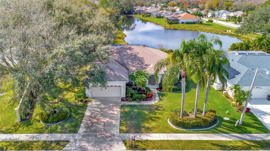 Rented Jan-March 2026. Waterfront Pool Home with Full “Class A” Golf Membership in Tara Golf & Country Club! Welcome to this beautifully maintained 2-bedroom + den, 2-bath, 2-car garage home offering breathtaking water views and stunning sunsets from your private pool area. Located in the highly sought-after Tara Golf & Country Club, this home includes a full “Class A” golf membership — a dream come true for any golf enthusiast! Inside, you'll find oak-look tile flooring throughout, combining elegance with easy maintenance. The open-concept kitchen features granite countertops, stainless steel appliances, wood cabinetry, and a pantry, perfect for entertaining or everyday living. The spacious primary suite boasts his and her walk-in closets, sliding glass doors to the pool, and a luxurious bath with wood cabinets, granite counters, a roman walk-in shower, and a soaking tub. Work from home in the den, complete with custom built-in desk and cabinetry. Other upgrades include high ceilings, crown molding, plantation shutters, and rollaway storm shutters on the lanai (installed in 2020) for peace of mind during storm season. Resort-style amenities include an 18-hole championship golf course, lap pool, fitness center, Har-Tru tennis courts, pickleball, bocce ball, sauna, hot tub, driving range, putting green, pro shop, and an elegant clubhouse with fine dining, grill room, and ballroom. Plus, enjoy a vibrant social calendar year-round! All of this is just minutes from I-75, UTC Mall, Benderson Park, SRQ Airport, Jiggs Landing, top-rated dining and shopping — and just a short drive to award-winning Gulf Coast beaches. Don’t miss this rare opportunity to rent in paradise — located in one of Bradenton’s premier golf communities!