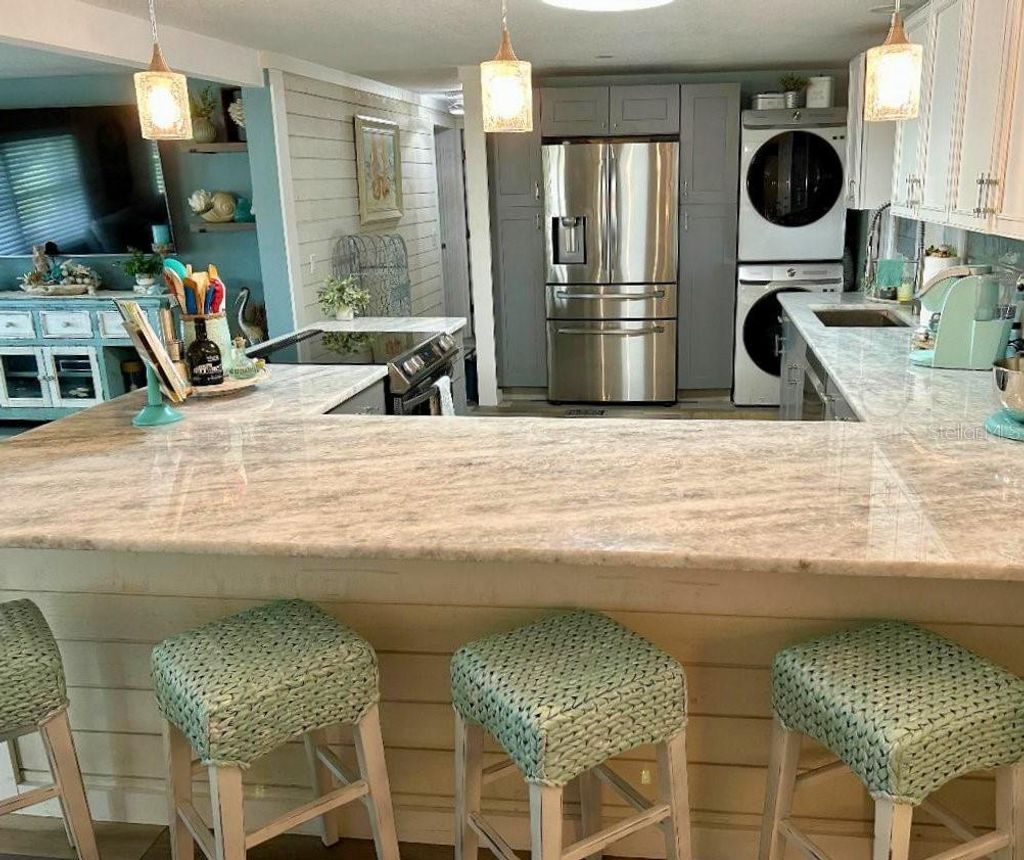 Photo of 41 Sabal Palm Drive, Largo, FL 33770 (MLS # TB8385416)