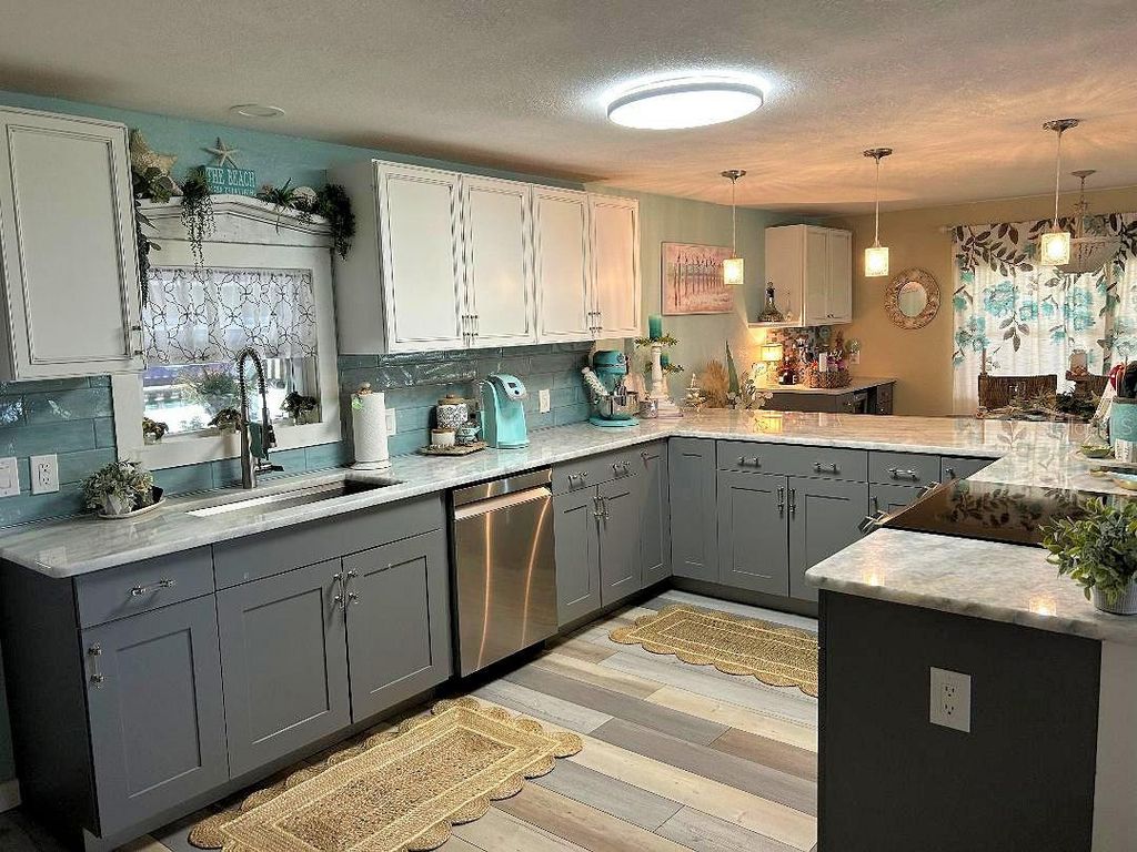 Photo of 41 Sabal Palm Drive, Largo, FL 33770 (MLS # TB8385416)