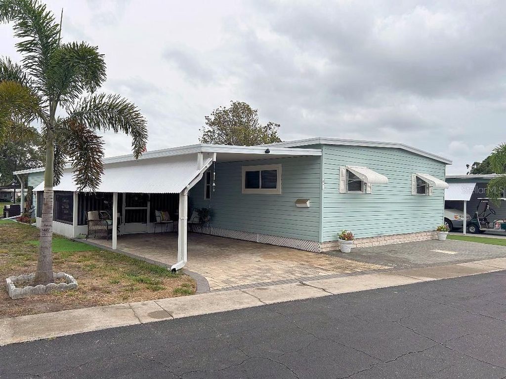 Photo of 41 Sabal Palm Drive, Largo, FL 33770 (MLS # TB8385416)