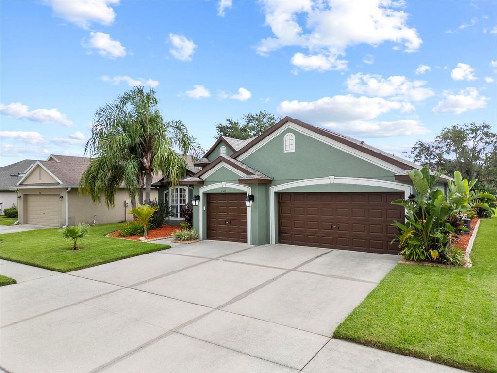 Photo of 4512 Pointe O Woods Drive, Wesley Chapel, FL 33543 (MLS # TB8396732)