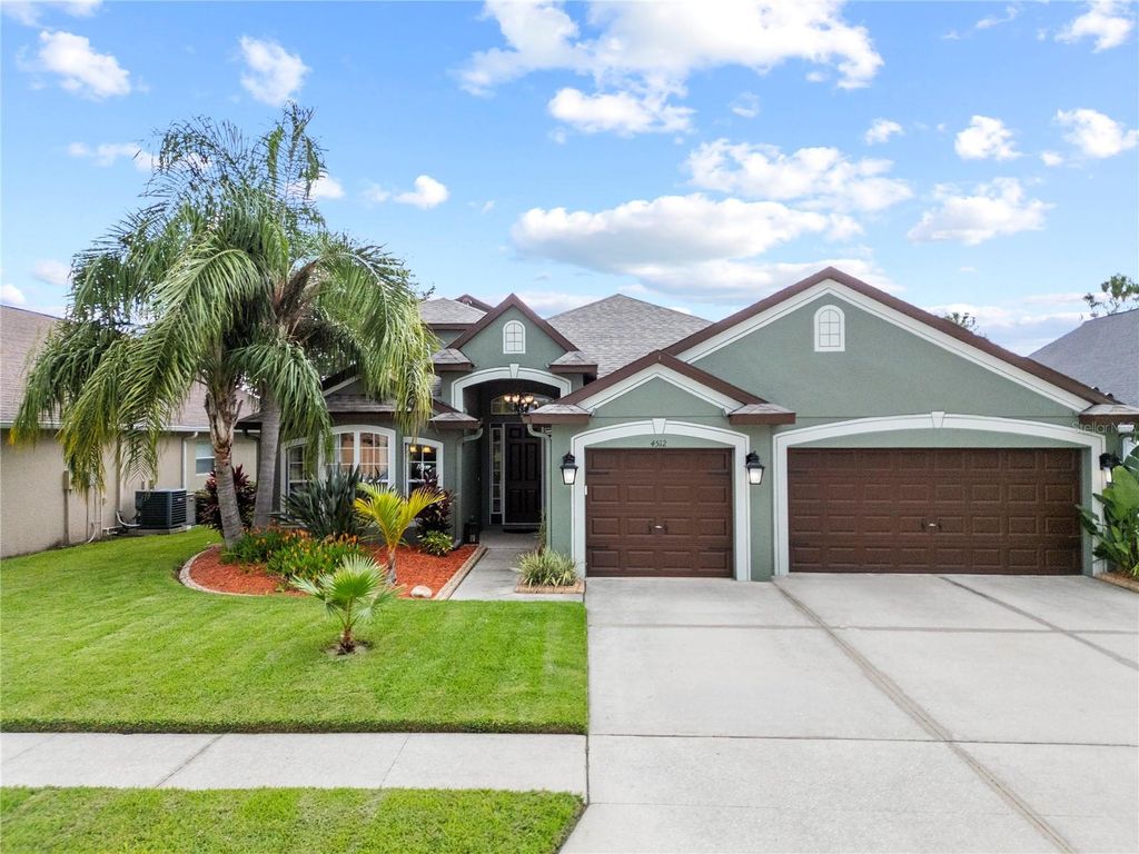 Photo of 4512 Pointe O Woods Drive, Wesley Chapel, FL 33543 (MLS # TB8396732)