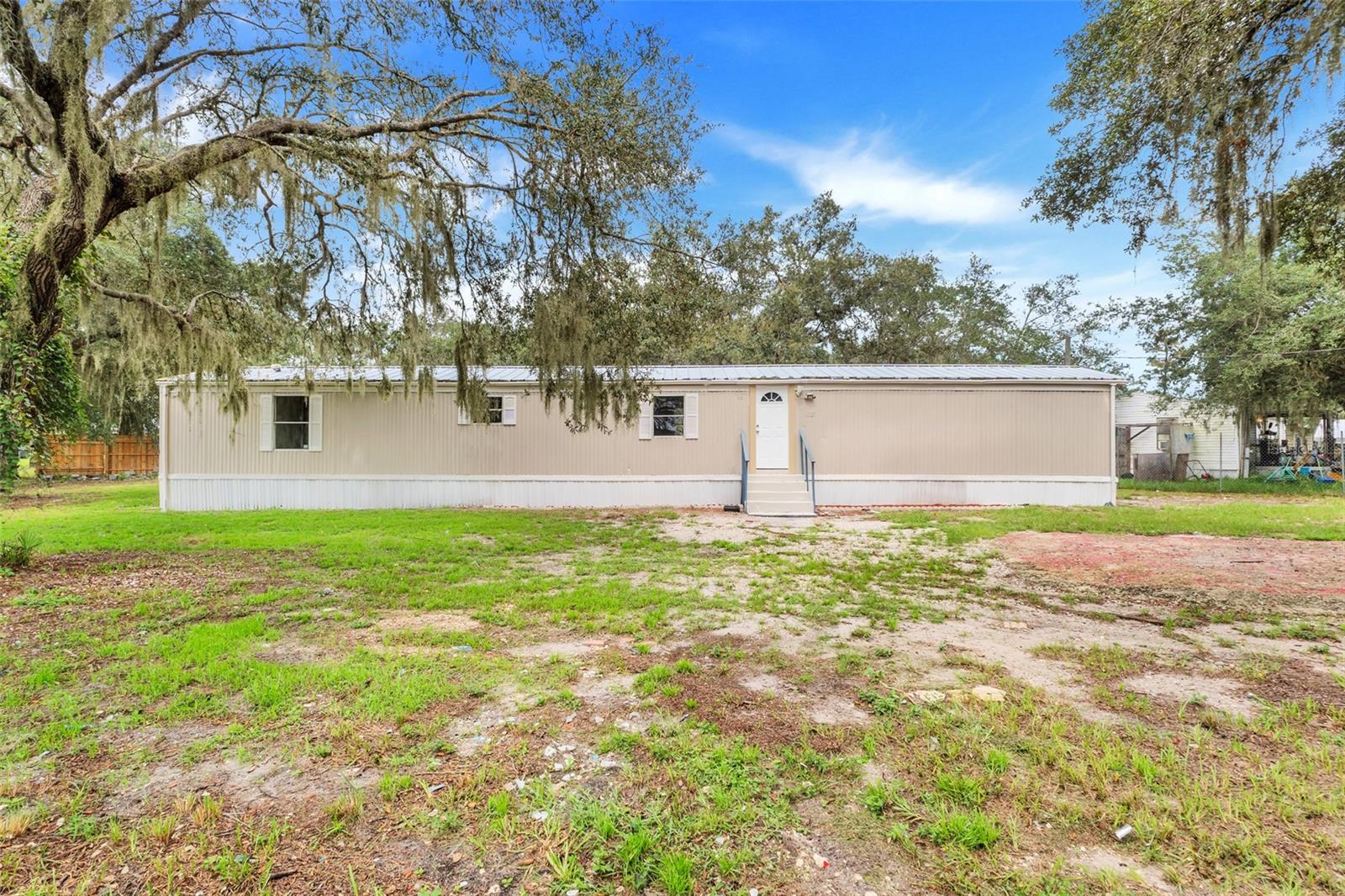 Newly Renovated & Move-In Ready! This beautifully updated home features a brand-new 2025 AC. Enjoy modern living with new tile flooring throughout, a fully remodeled kitchen with contemporary finishes, and stylish updated bathrooms. Sitting on a huge lot, this property offers plenty of room for outdoor living, entertaining, or future expansion. Quite and private cul-de-sac in the back of the community. No HOA makes it great for owners or investors. Don’t miss this turn-key home with major upgrades already done — just move in and enjoy!