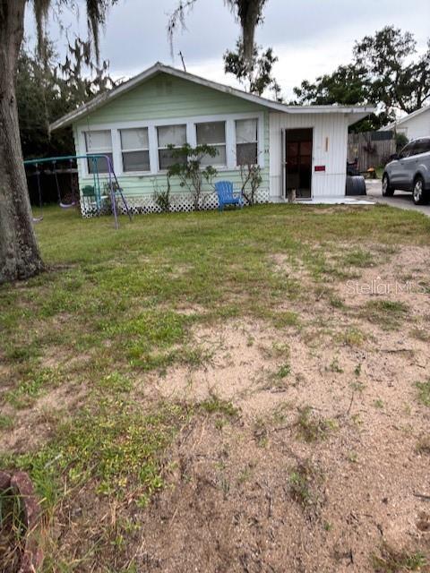 GREAT INVESTMENT OPPORTUNITY - 2 SEPARATE PROPERTIES. MAIN HOUSE HAS 3 BEDROOM 2 BATHS. SEPARATE MOTHER IN LAW SUITE HAS 1 BEDROOM 1 BATH ON ADJOINING PROPERTY. MAIN HOUSE HAS ENCLOSED PORCH, OPEN PORCH, FLORIDA ROOM, SEPARATE DINING ROOM, SPLIT BEDROOMS, METAL ROOF. CAN ALSO BE LIVING QUARTERS AND INCOME PROPRTY FOR MOTHER IN LAW SUITE.