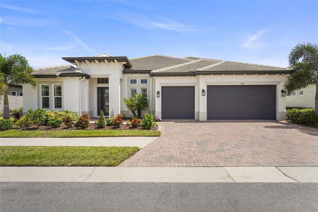 Photo of 6173 Lungo Lago Drive, Sarasota, FL 34241 (MLS # A4661590)