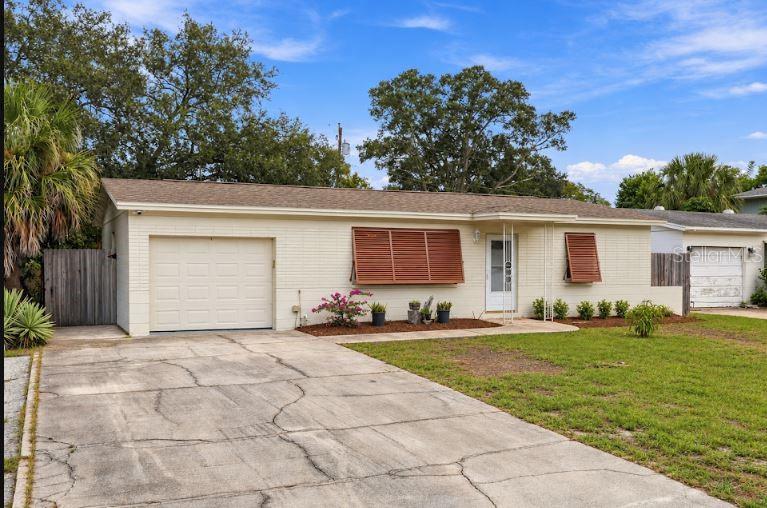 Photo of 10473 Cirimoya Lane, Seminole, FL 33772 (MLS # TB8553171)