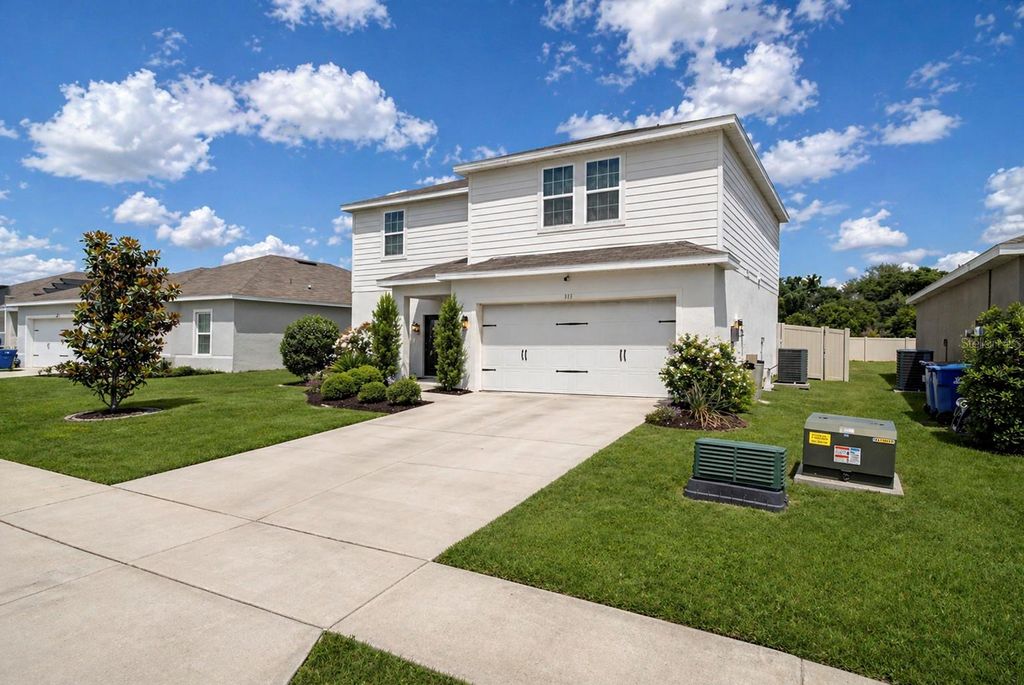 Photo of 313 Fiddlewood Court, Davenport, FL 33837 (MLS # O6402615)
