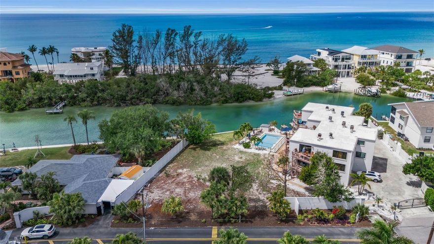 A rare offering on the south end of Siesta Key, this 0.25-acre waterfront lot on Blind Pass delivers an exceptional canvas for coastal living and development. With protected water frontage and direct access leading out to Sarasota Bay, the location is ideal for enjoying the area’s incredible boating, fishing, kayaking and the breathtaking sunsets that paint the sky each evening. Zoned RMF 3, the property allows for two attached 3,000-square-foot residential townhomes, offering outstanding flexibility, whether you envision a multi-residence project, luxury townhomes, or creating an island paradise ideal for a family vacation compound. Just three minutes from world-famous, white-sand Siesta Key Beaches, this site also provides convenient access with a short drive to Siesta Key Village, known for its shopping and dining. Only a bridge away from the mainland, you’re close to all Sarasota has to offer, including cultural venues, marinas and urban conveniences. A standout waterfront opportunity in one of Sarasota’s desirable coastal corridors.
