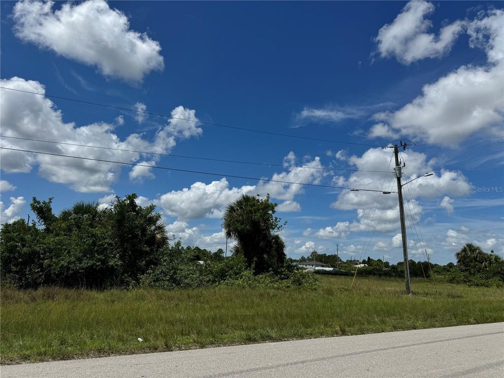 Photo of 836 Jaguar Boulevard, Lehigh Acres, FL 33974 (MLS # OM717607)