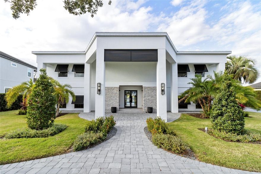 Completely Renovated home set  on 3rd Tee overlooking a lake in Arnold Palmer’s Bay Hill Golf Community. New Roof,  New Windows & doors, New flooring, new appliances and all new cabinetry and design and much much more. This superb home boasts almost 6300 sq ft with roaring 10 ft ceilings throughout the first & second floor. This home offers 5 Bedrooms, 6 bathrooms and  half baths. Upon entering you will find the duel stair case with dome ceiling and a breath taking view of the golf course.  The kitchen features a large island, double refrigerator and contemporary kitchen cabinet design that is a must see.  The open concept kitchen, eating area, dining room and Greatroom over looks the pool, golf course and lake. Also located on first floor  a movie theater with stadium seating and a wet Bar.  Enjoy a private study with built in shelving. The study can be the 6th bedroom and features a walk in closet located on first floor. 
The Primary suite is located on the second floor, with amazing views of golf course with a oversized walk-in closets that features purse and shoe closet, dressing area with mirrors as  well as a separate exercise or message room overlooking golf course. Primary en-suite has a beautifully design with shower and tub enclosed in glass.   The  laundry room is second floor. The upstairs consists of 5 bedrooms - 3 of the bedrooms have  en-suites. a  Enjoy breathtaking views of Championship Golf Course. Welcome Home to 3rd Tee.