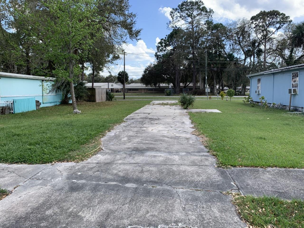 rare mobile home lot in no HOA subdivision water and sewer at site go show