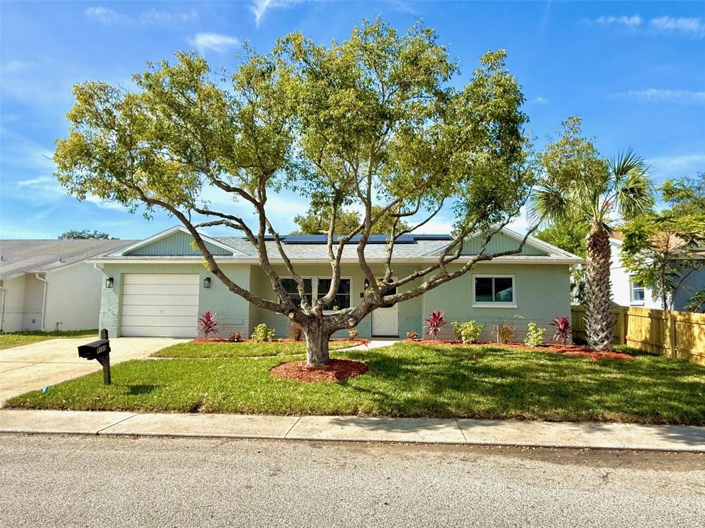 Photo of 9105 Ledgestone Lane, Port Richey, FL 34668 (MLS # TB8452011)