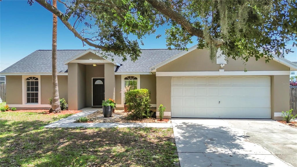 Photo of 210 Robbins Rest Circle, Davenport, FL 33896 (MLS # O6419891)