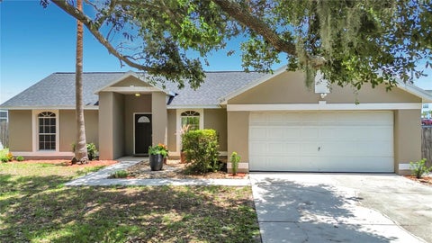 Photo of 210 Robbins Rest Circle, Davenport, FL 33896 (MLS # O6419891)