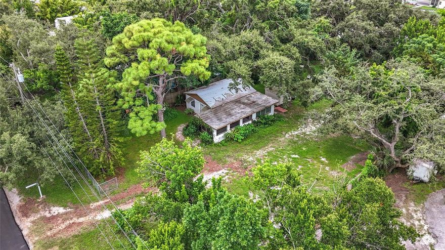 small house 643 sqft on almost half an acre of land