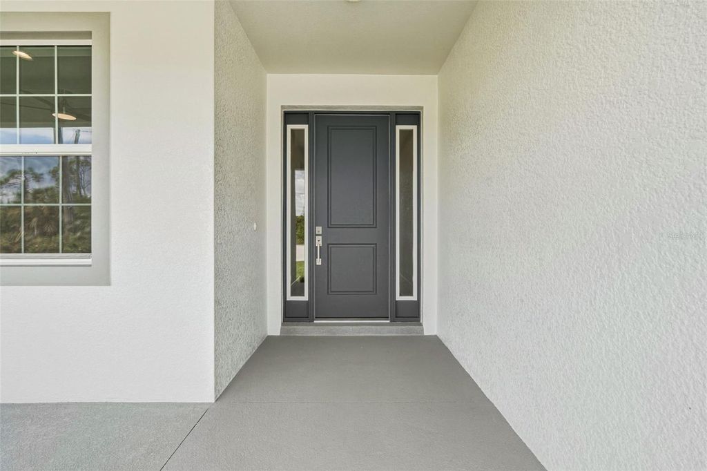 Photo of 141 Swan Drive, Rotonda West, FL 33947 (MLS # TB8498786)