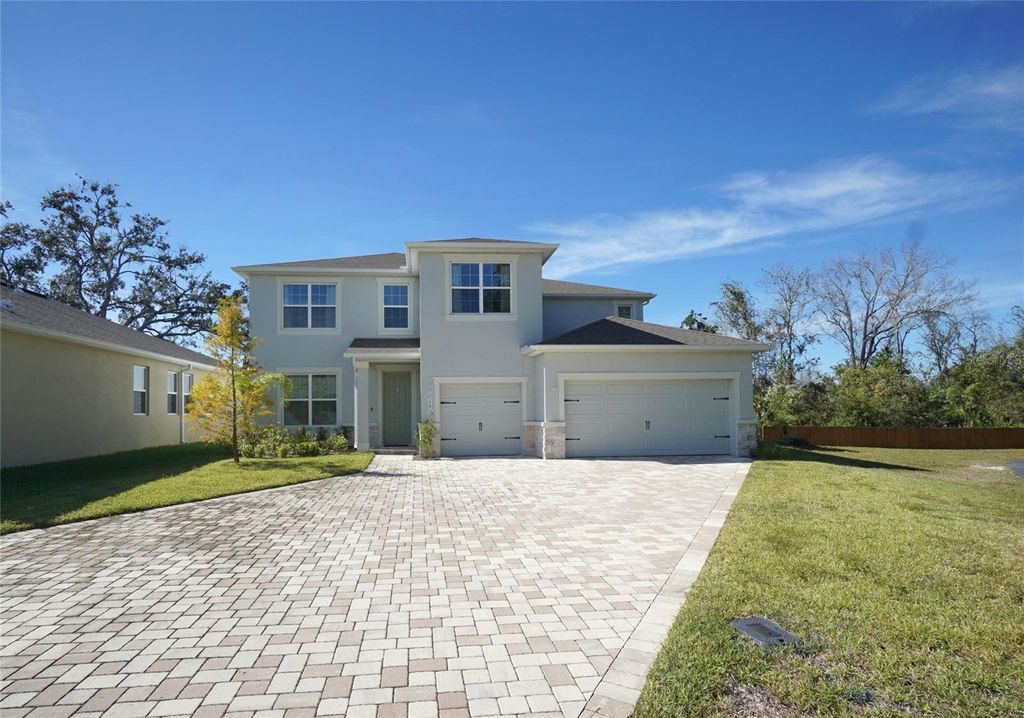 Photo of 22990 Scaglione Drive, Lutz, FL 33549 (MLS # TB8466589)